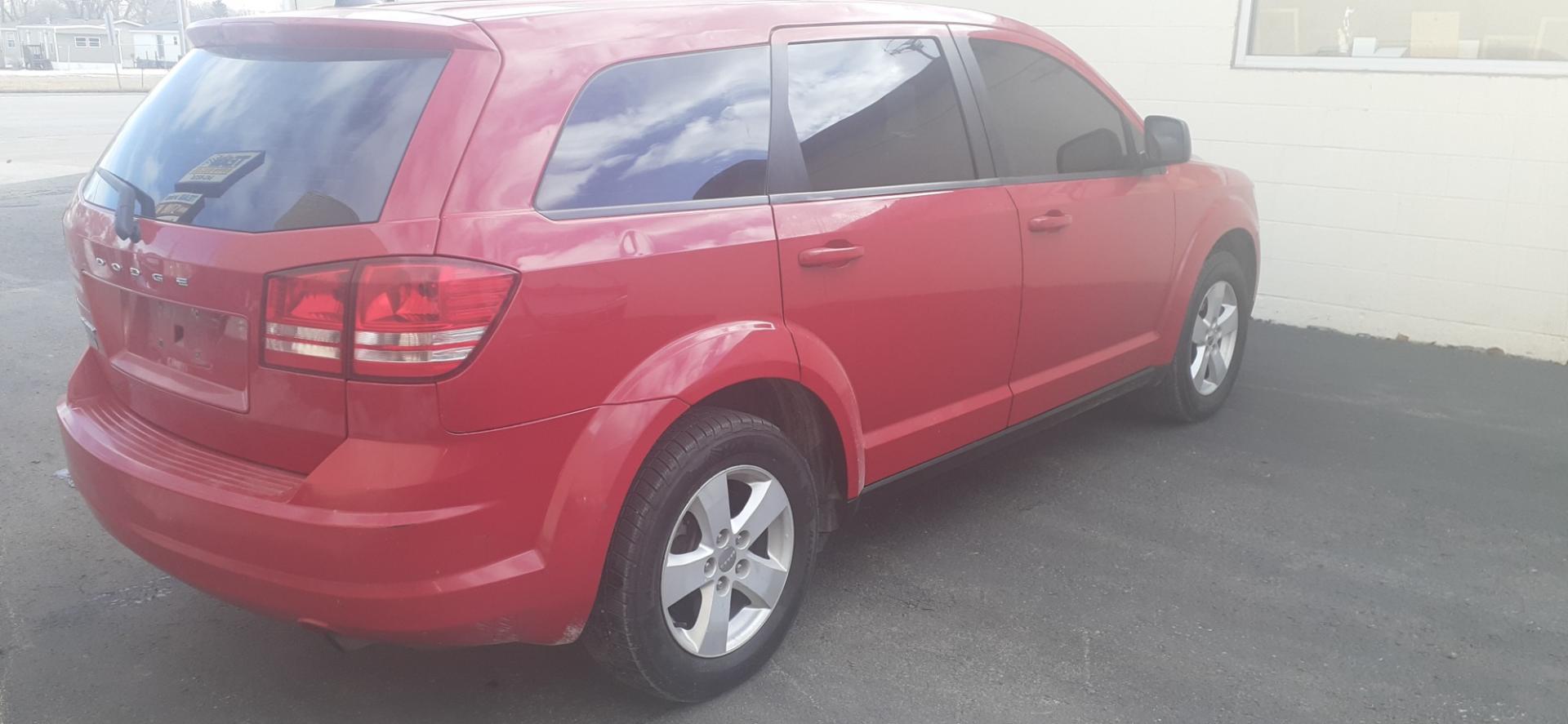 2013 Dodge Journey SE (3C4PDCAB4DT) with an 2.4L L4 DOHC 16V engine, 4-Speed Automatic transmission, located at 2015 Cambell Street, Rapid City, SD, 57701, (605) 342-8326, 44.066433, -103.191772 - Photo#5